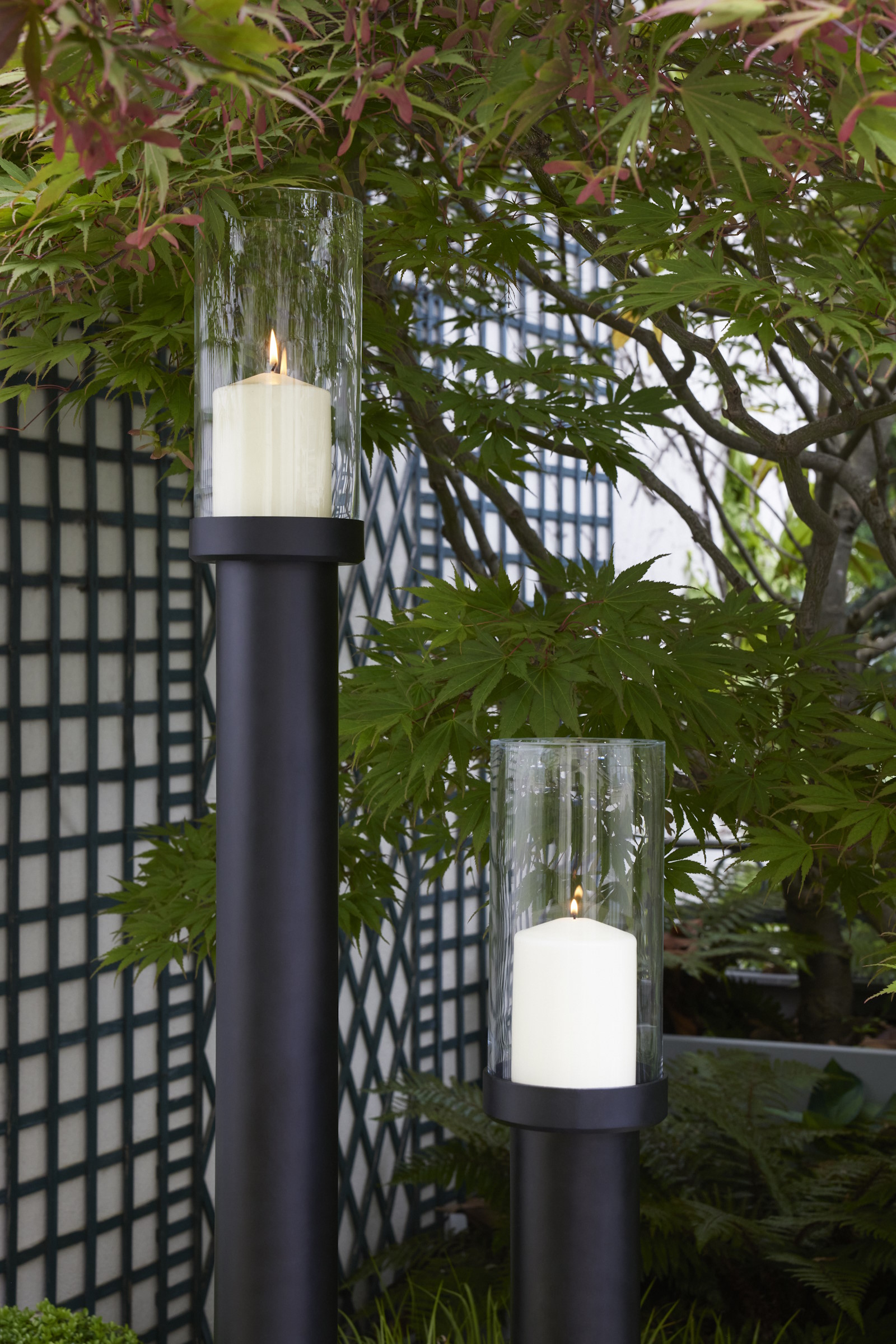 Exterior standing candle unit